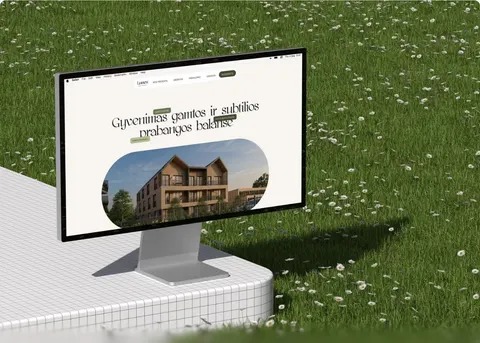 Lumen Park website on a Studio Display in a meadow